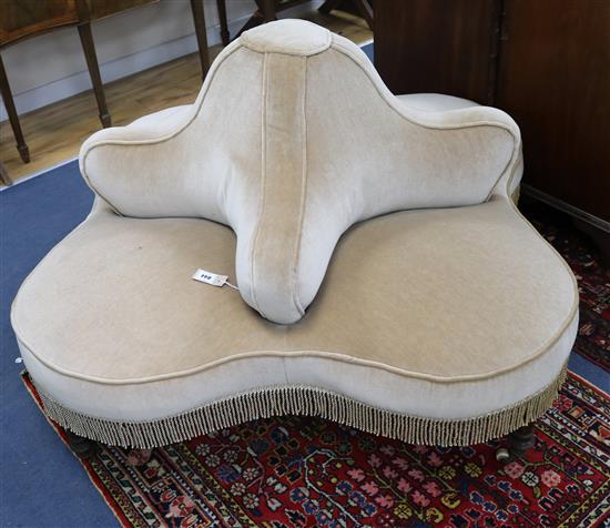 A Victorian dralon upholstered four seat conversation settee